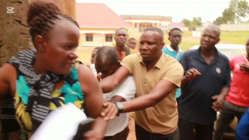 Chaos at School as Students and Teachers Shield Director from Parents in Road Dispute